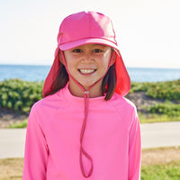 Girls Pink Legionnaire Sun Hat Upf 50 Size S Xl Girl Smiling Wearing Pink Hat on the Side Walk Sunpoplife