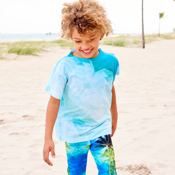 Kids Geometrical Graphic Tshirt Green Aqua Size Xs L Unisex Geo Tropical Smiling Boy At The Beach Looking Down Sunpoplife