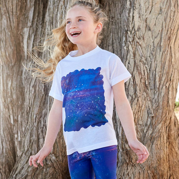 Kids Whale Graphic Tshirt Size Xs L White Purple Unisex Cosmos Cetus Constellations Surfer Girl Smiling In Front Of A Brown Tree Sunpoplife