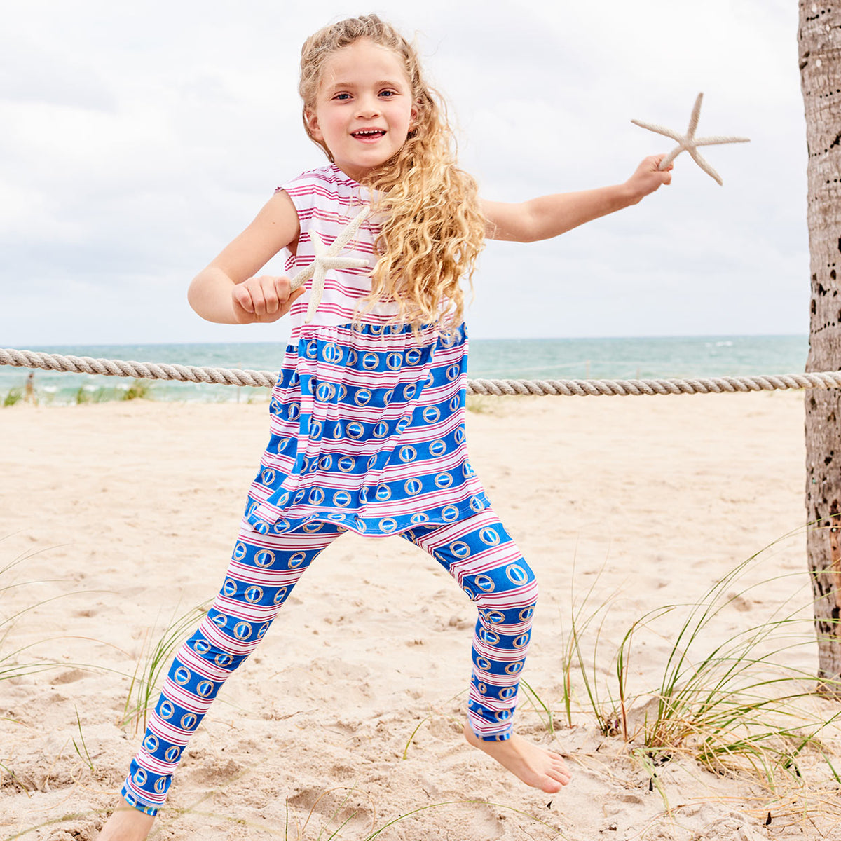 Mariner Hybrid Leggings Upf50 Kids Boys Girls Size 2 6 Red White Blue Stripes Denim Modern Mariner Unisex Girl On The Beach Jumping Wearing Leggings Under A Dress Sunpoplife