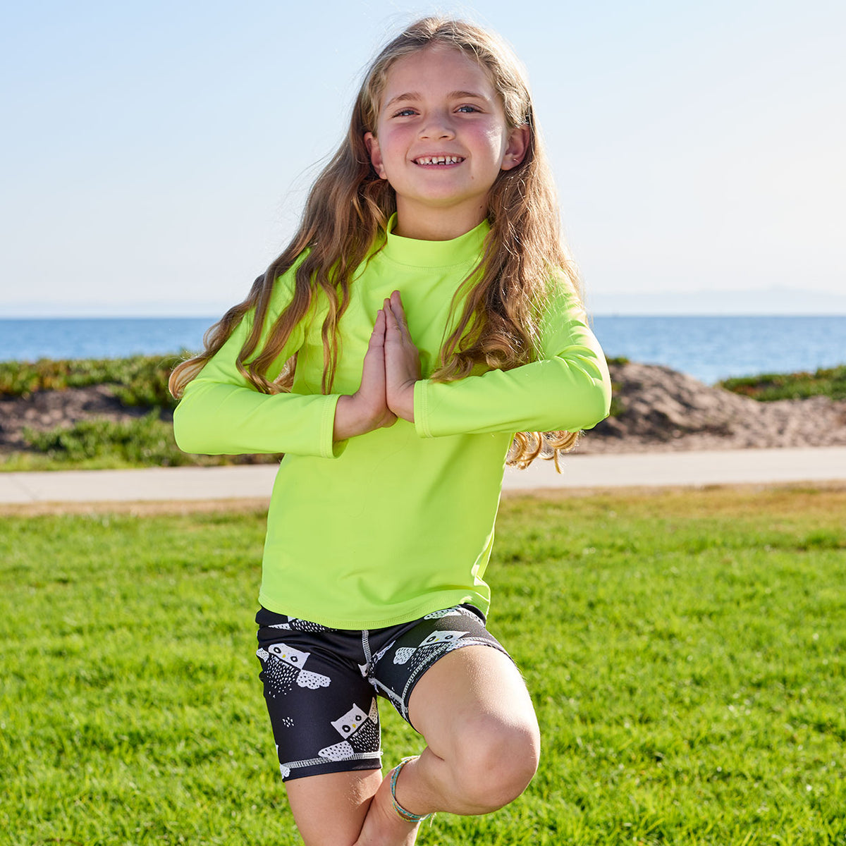 Yellow Kids Long Sleeve Rash Guard Top Upf50 Boys Girls Unisex Size 2 12 Girl Doing Yoga by the Beach Sunpoplife